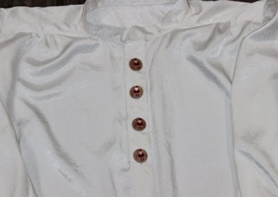 White neck buttons